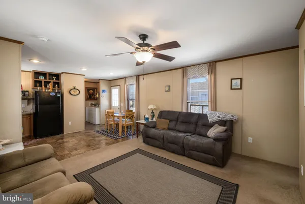a living room with furniture and a table