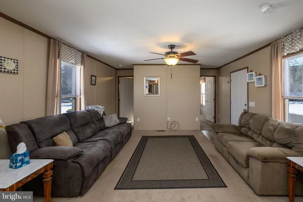 a living room with furniture and a couch
