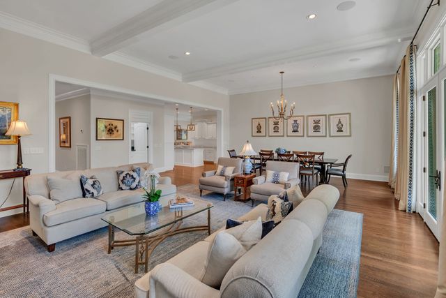 a spacious bathroom with a tub sink shower and mirror