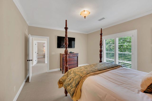 a view of a backyard with sitting area