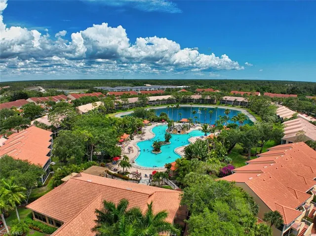 an aerial view of ocean residential houses with outdoor space and seating