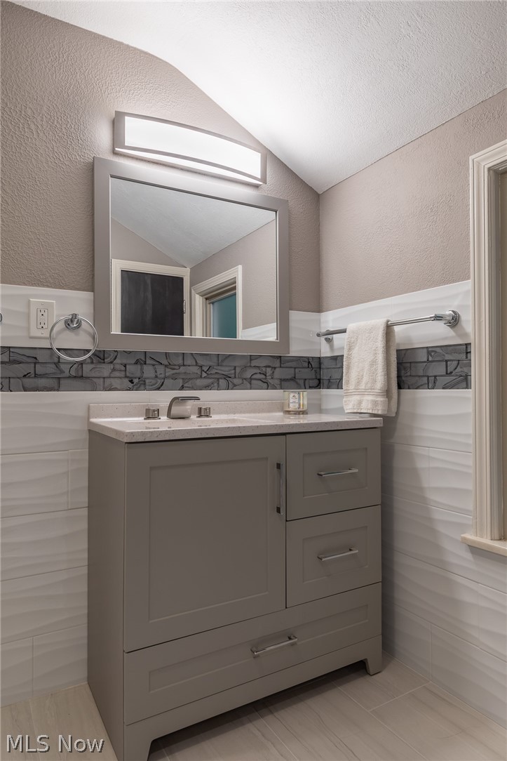 3674 Stoneleigh Road Cleveland, OH 44121 - Photo 24 of 35 The Main Bathroom has custom ceramic tile and custom fixtures