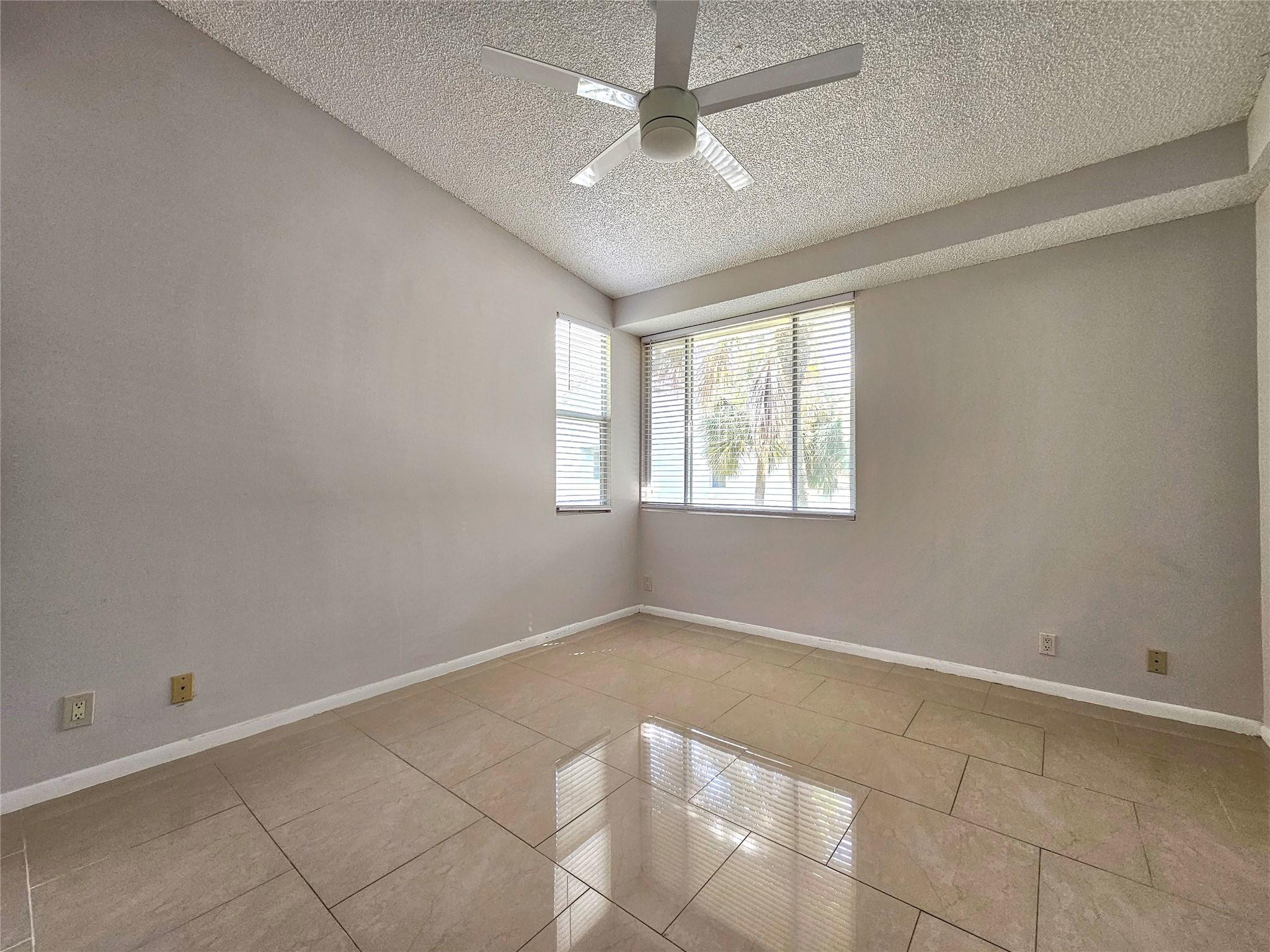 631 Lyons Road, Unit 12207 Pompano Beach, FL 33063 - Photo 16 of 30 CORNER UNIT SO EXTRA WINDOWS IN BEDROOMS