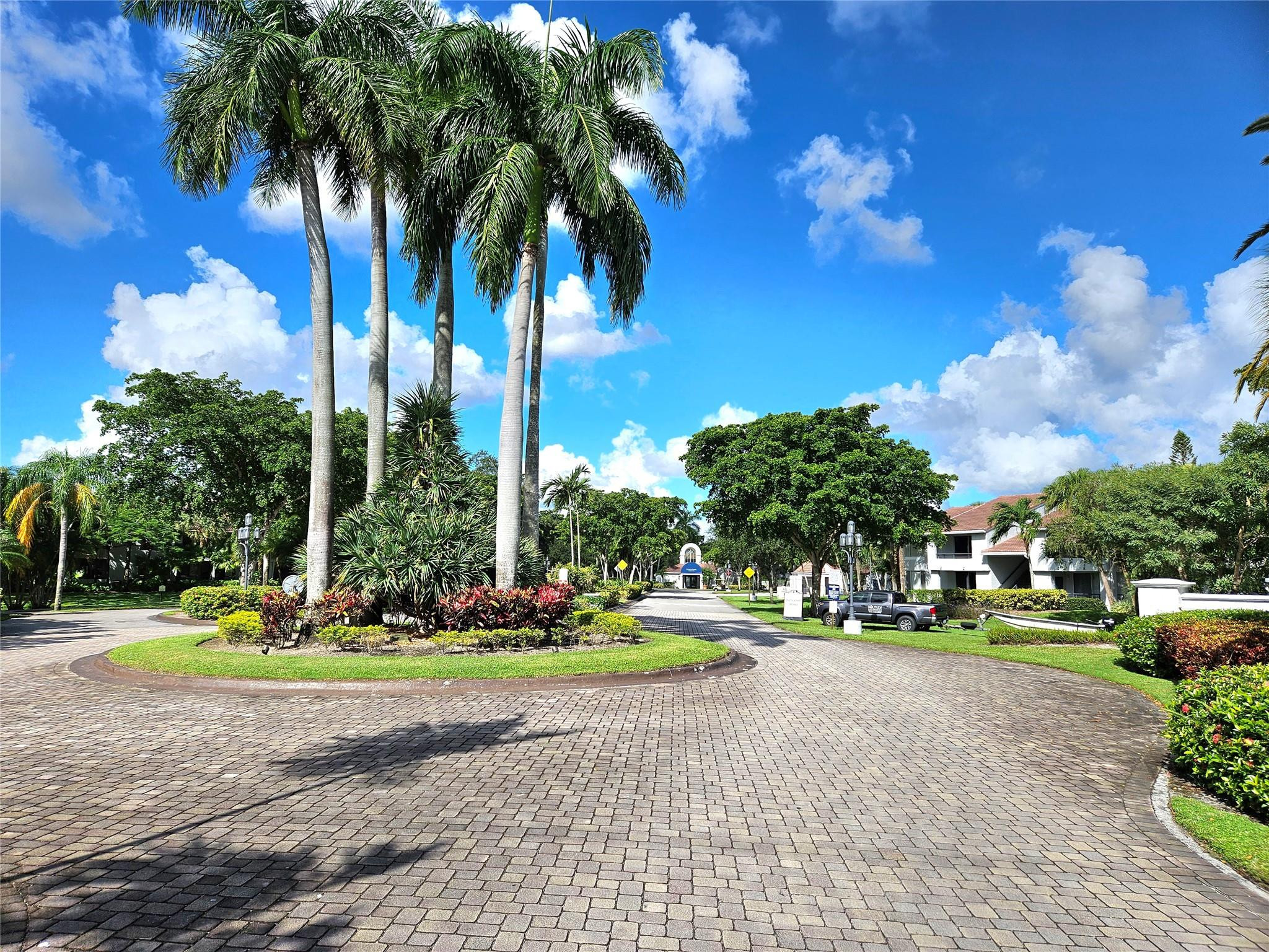 631 Lyons Road, Unit 12207 Pompano Beach, FL 33063 - Photo 29 of 30 ENTRANCE TO COCO PARC