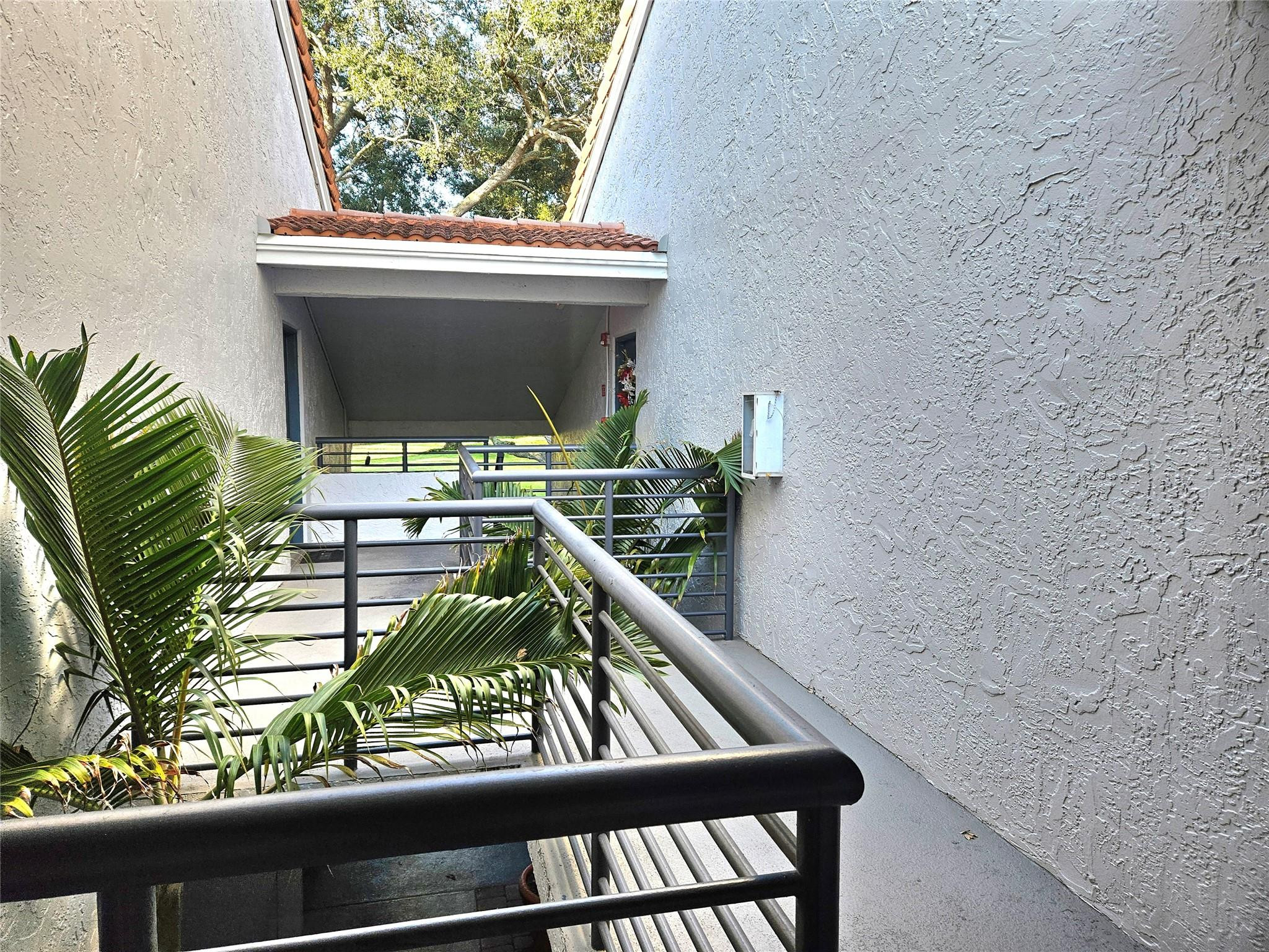 631 Lyons Road, Unit 12207 Pompano Beach, FL 33063 - Photo 5 of 30 YOUR BREEZEWAY
