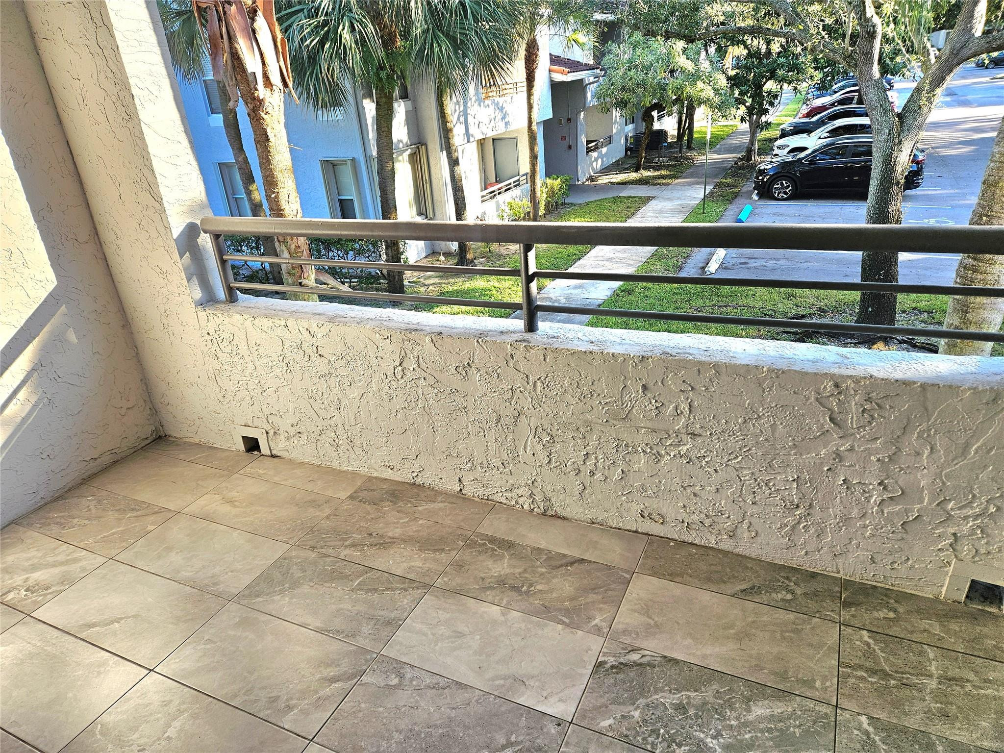 631 Lyons Road, Unit 12207 Pompano Beach, FL 33063 - Photo 7 of 30 PRIVATE TILED BALCONY TO ENJOY