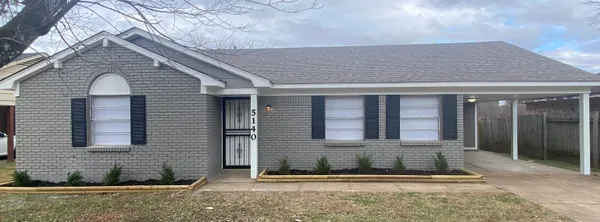a front view of a house with stairway
