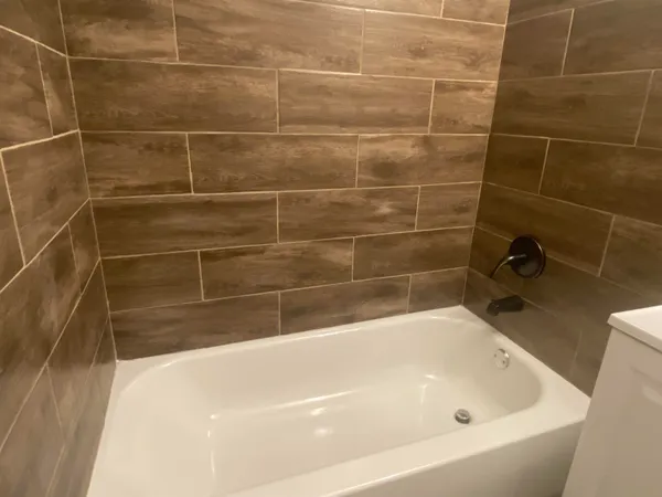 a bathroom with a bathtub