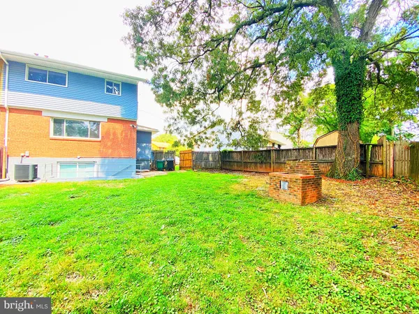 a view of a backyard with a garden