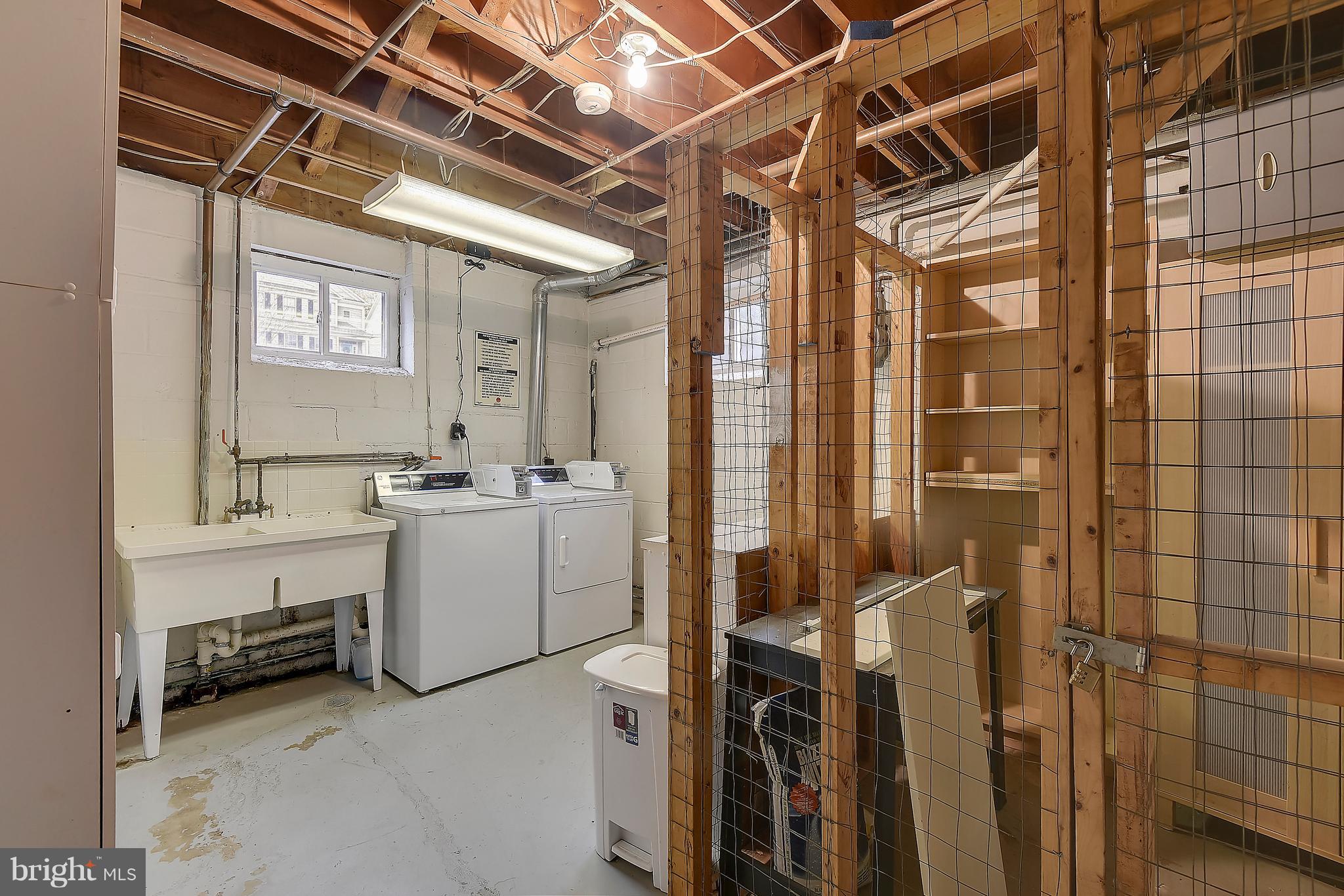 4023 18th Road North, Unit 1 Arlington, VA 22207 - Photo 16 of 30 a view of a bathroom with a sink and mirror