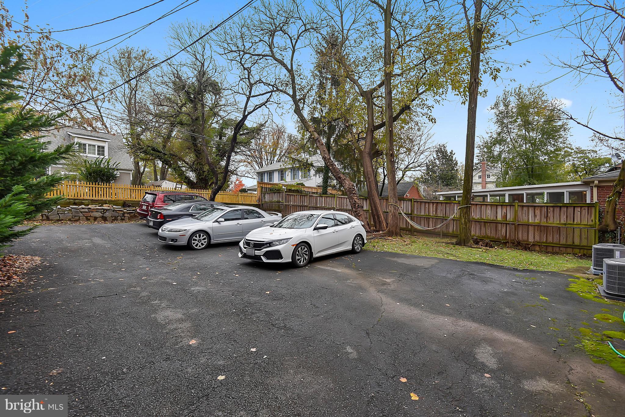 4023 18th Road North, Unit 1 Arlington, VA 22207 - Photo 21 of 30 a view of yard with car parked on road