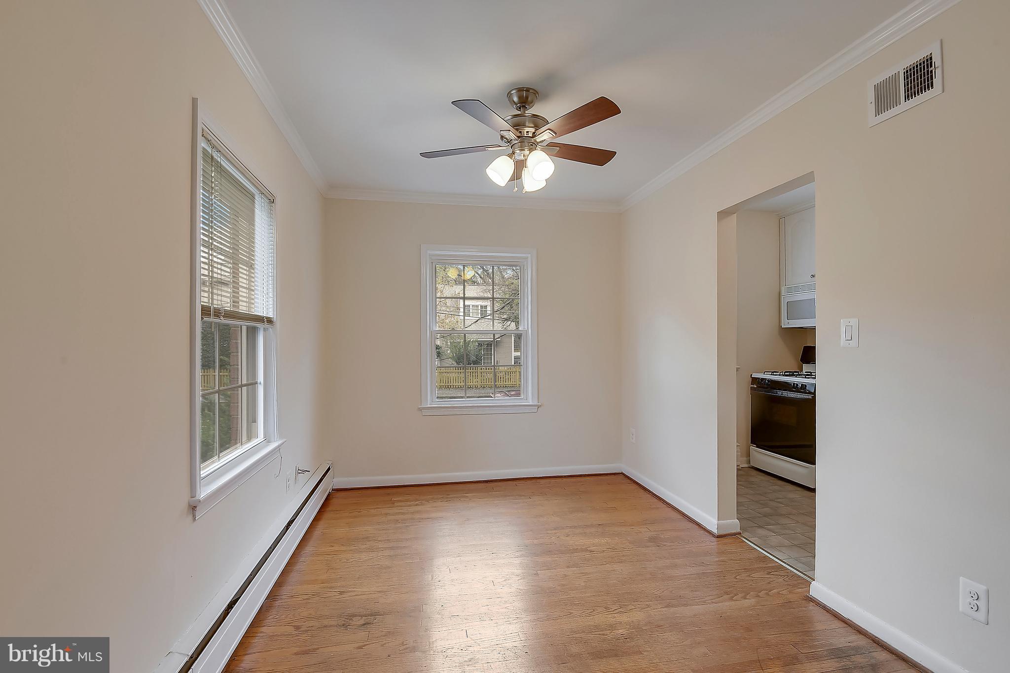 4023 18th Road North, Unit 1 Arlington, VA 22207 - Photo 6 of 30 a view of empty room with wooden floor and fan
