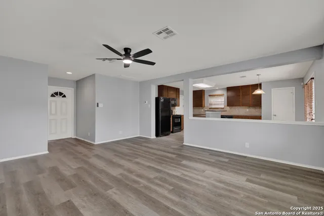 a view of a livingroom with a flat screen tv