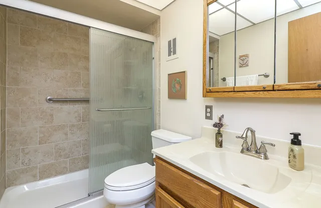 a spacious bedroom with a large bed and a window