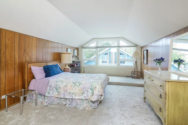 a bathroom with a sink a toilet and shower curtain