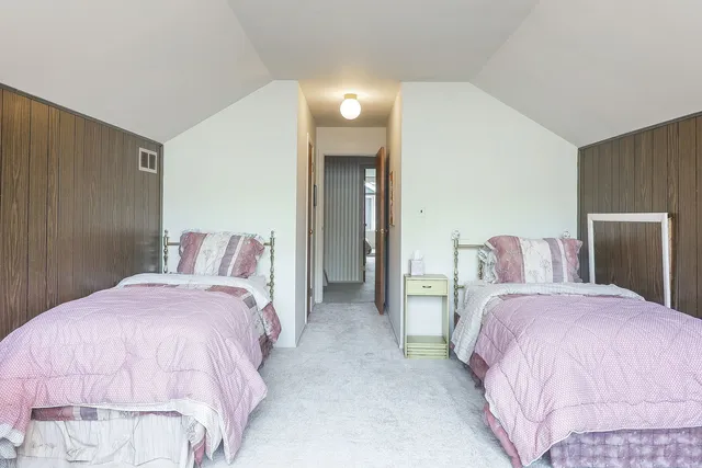 a swimming pool with trees in the background