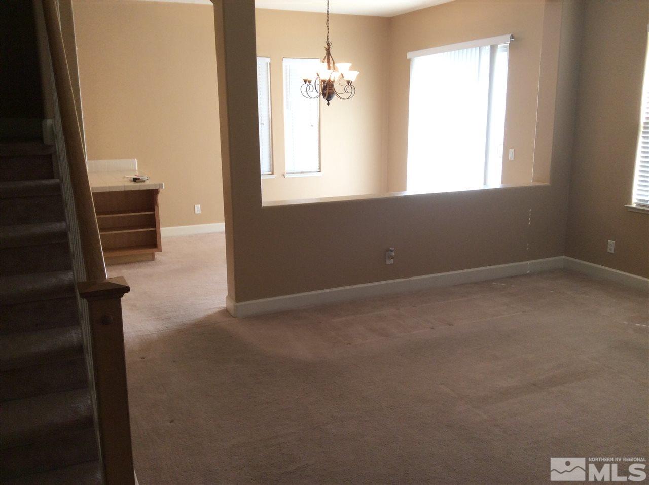 1660 Sawtooth Trail Reno, NV 89523 - Photo 12 of 18 an empty room with windows and closet