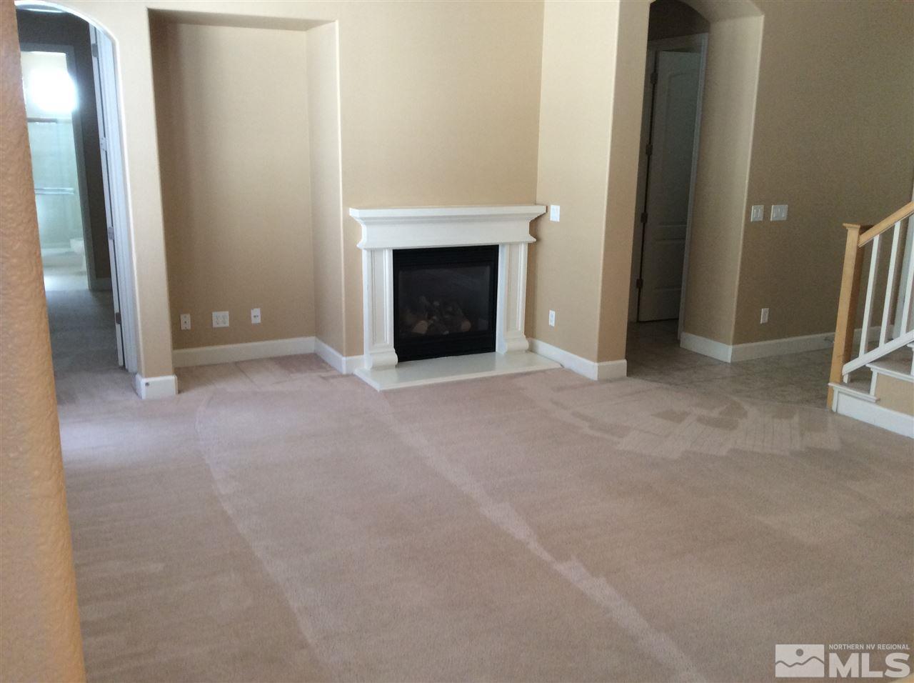 1660 Sawtooth Trail Reno, NV 89523 - Photo 16 of 18 a view of an empty room with a fireplace