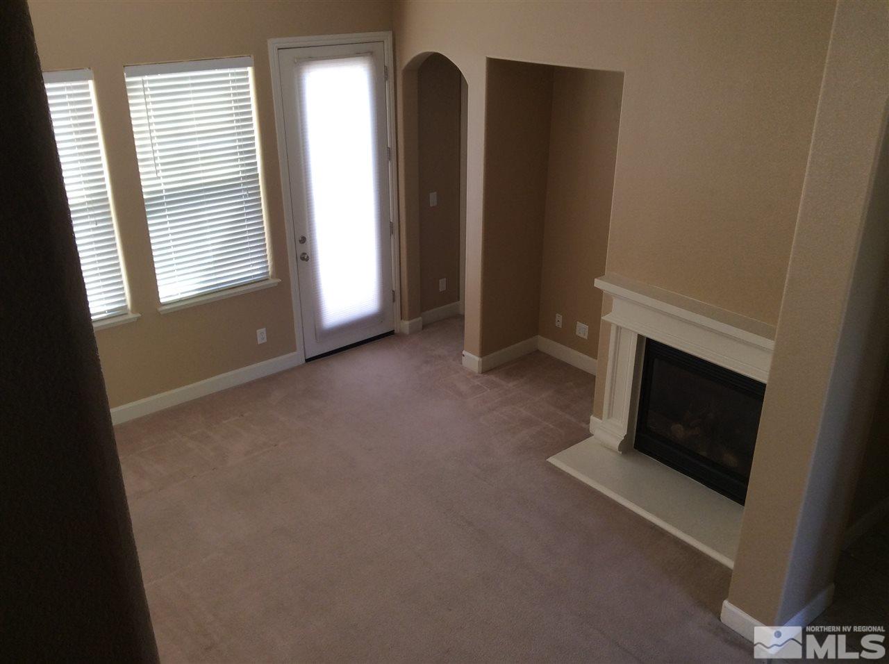 1660 Sawtooth Trail Reno, NV 89523 - Photo 6 of 18 a view of a livingroom with a fireplace