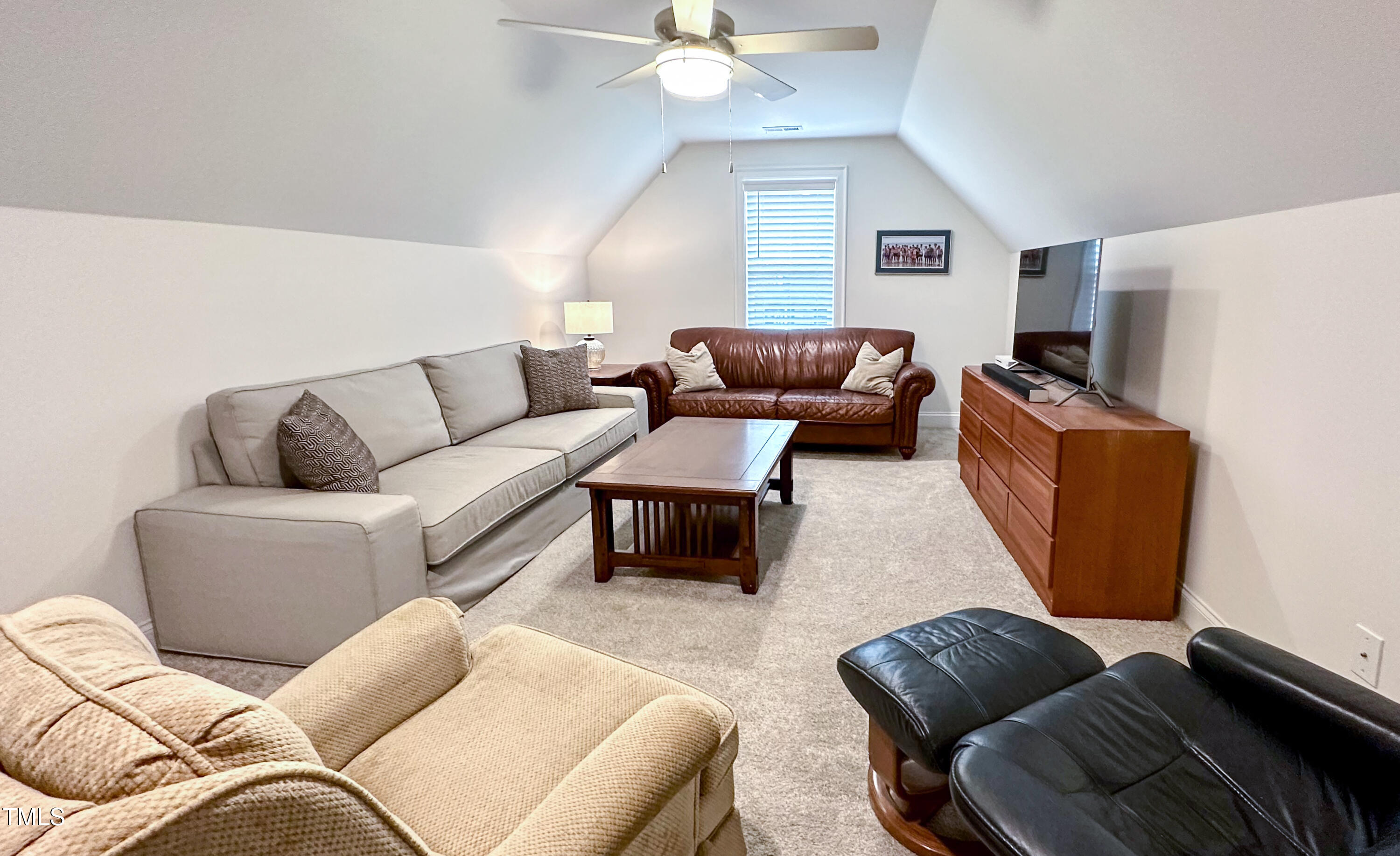 409 Eagle Court Henderson, NC 27536 - Photo 37 of 54 a living room with furniture and a couch
