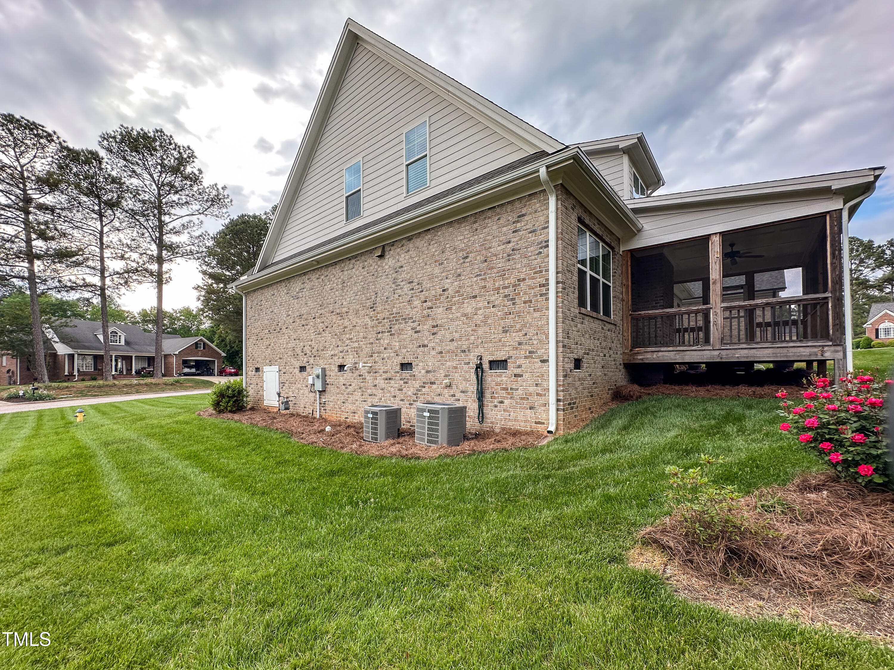 409 Eagle Court Henderson, NC 27536 - Photo 41 of 54 a view of a house with a yard and garden