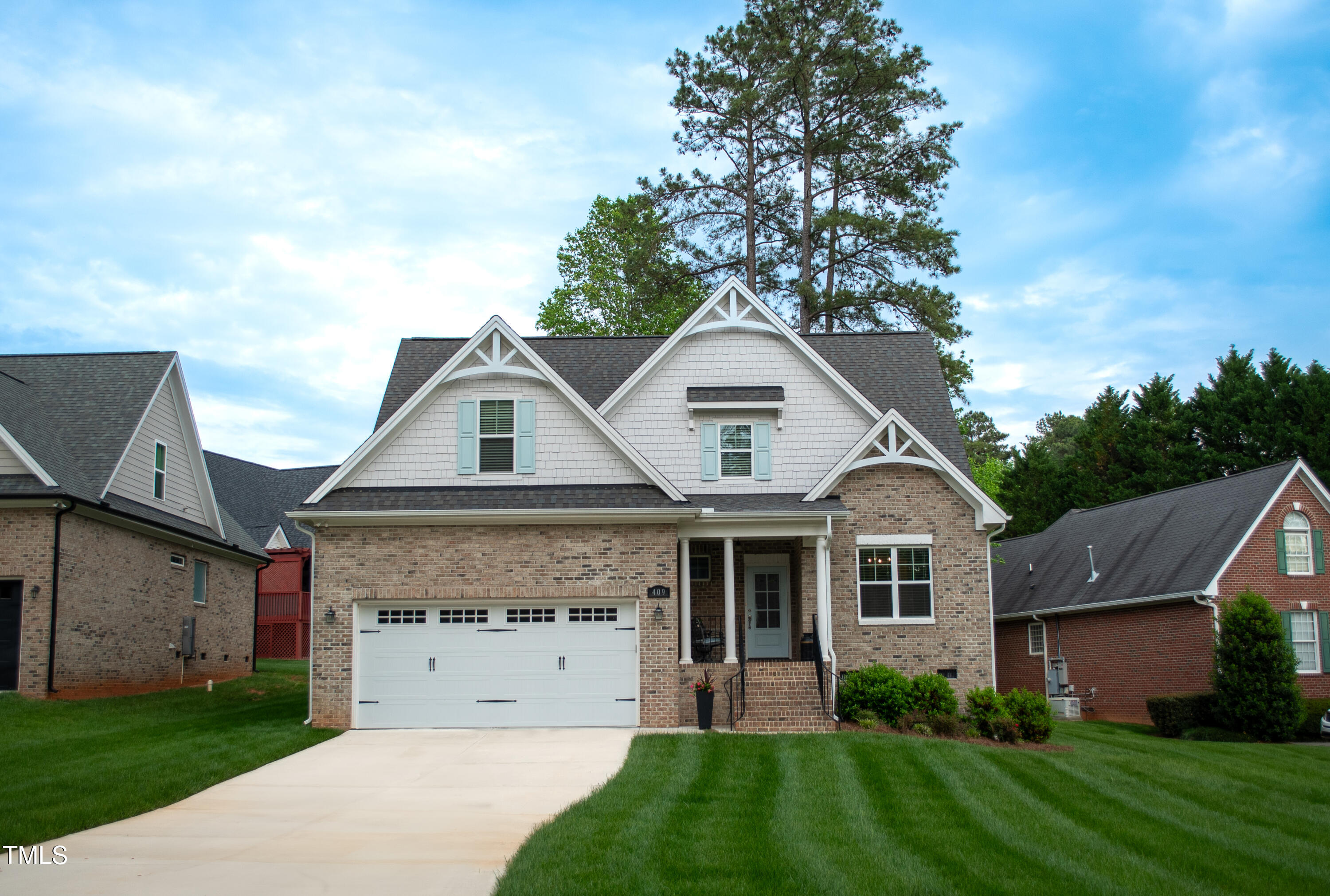 409 Eagle Court Henderson, NC 27536 - Photo 46 of 54 a front view of a house with a yard