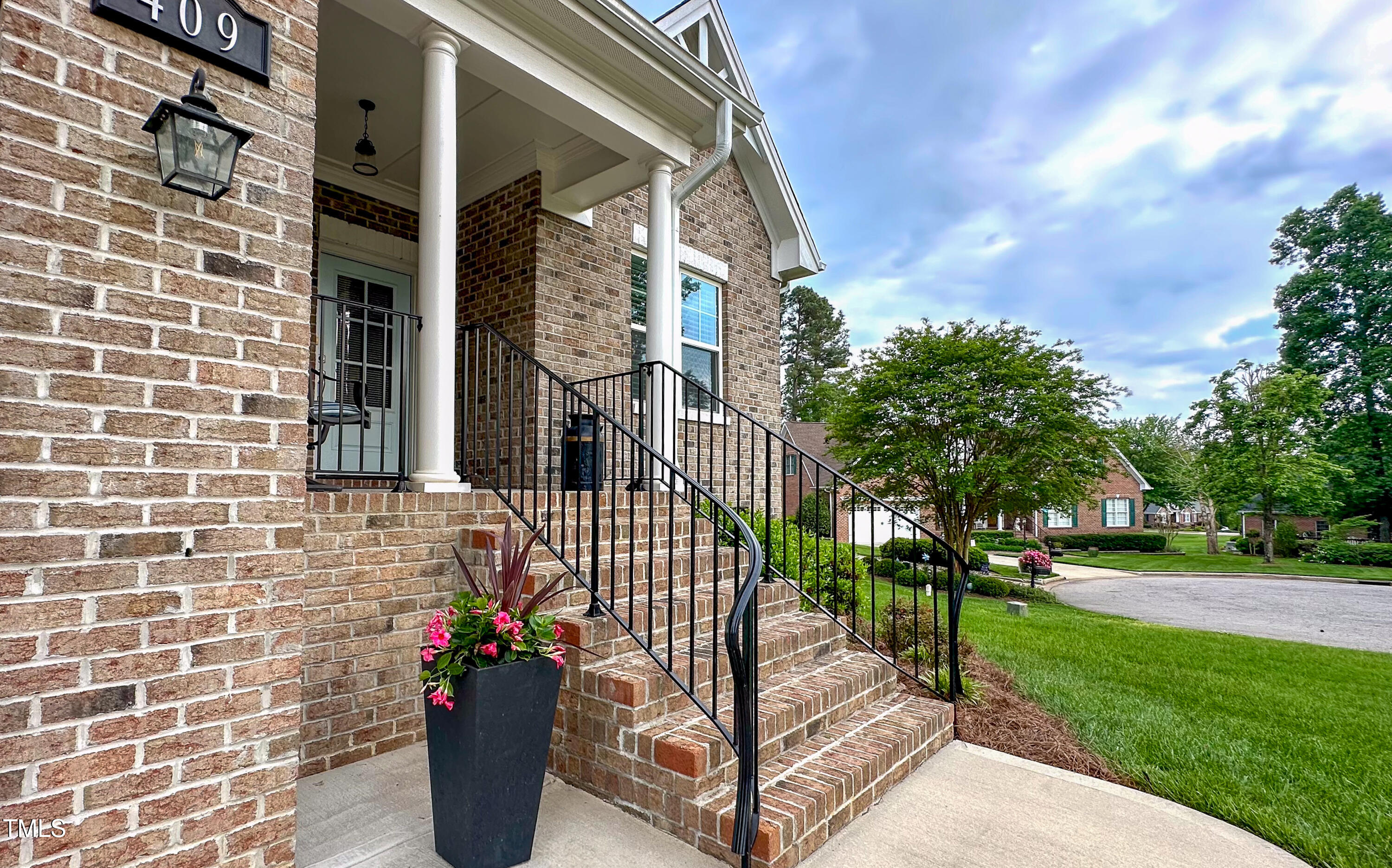409 Eagle Court Henderson, NC 27536 - Photo 48 of 54 a view of a building with a yard