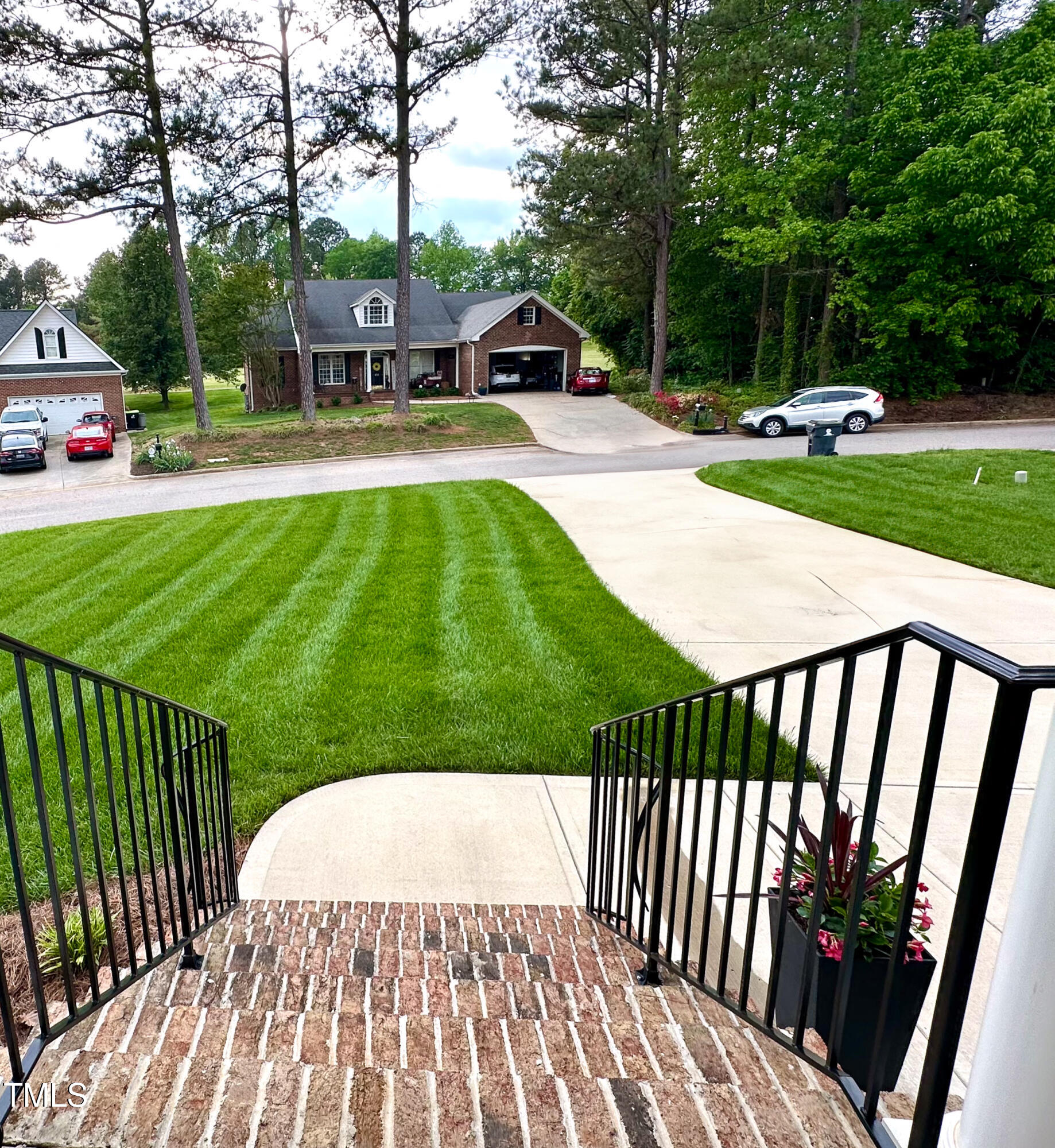 409 Eagle Court Henderson, NC 27536 - Photo 49 of 54 a view of a patio with a yard