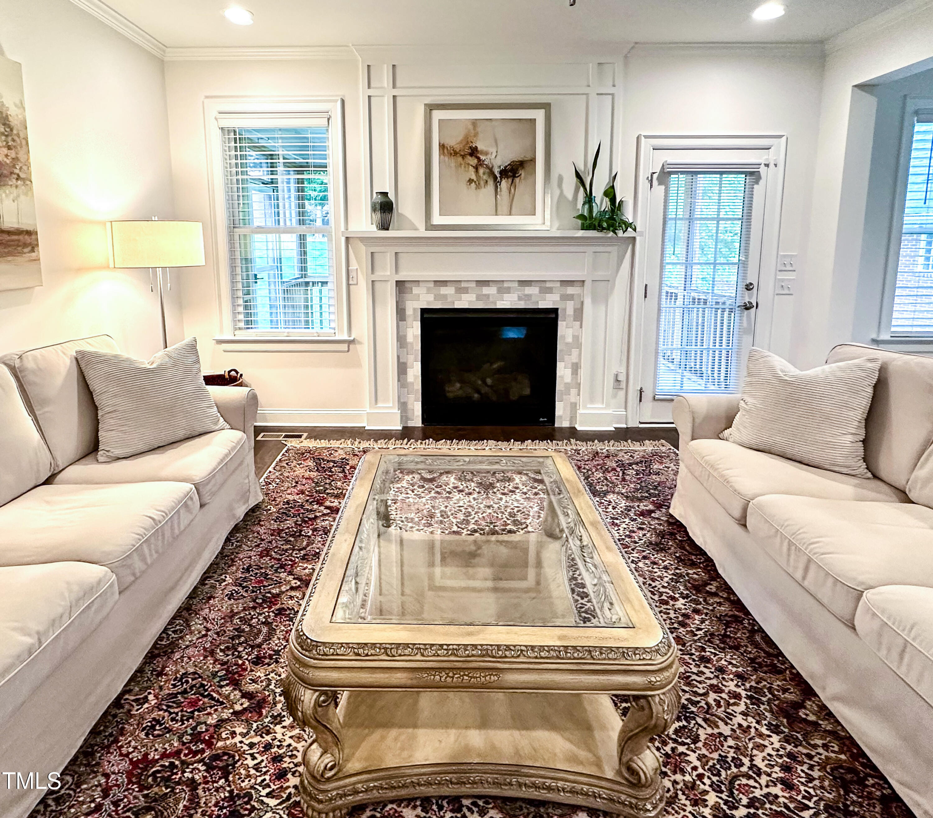 409 Eagle Court Henderson, NC 27536 - Photo 5 of 54 a living room with furniture and a fireplace