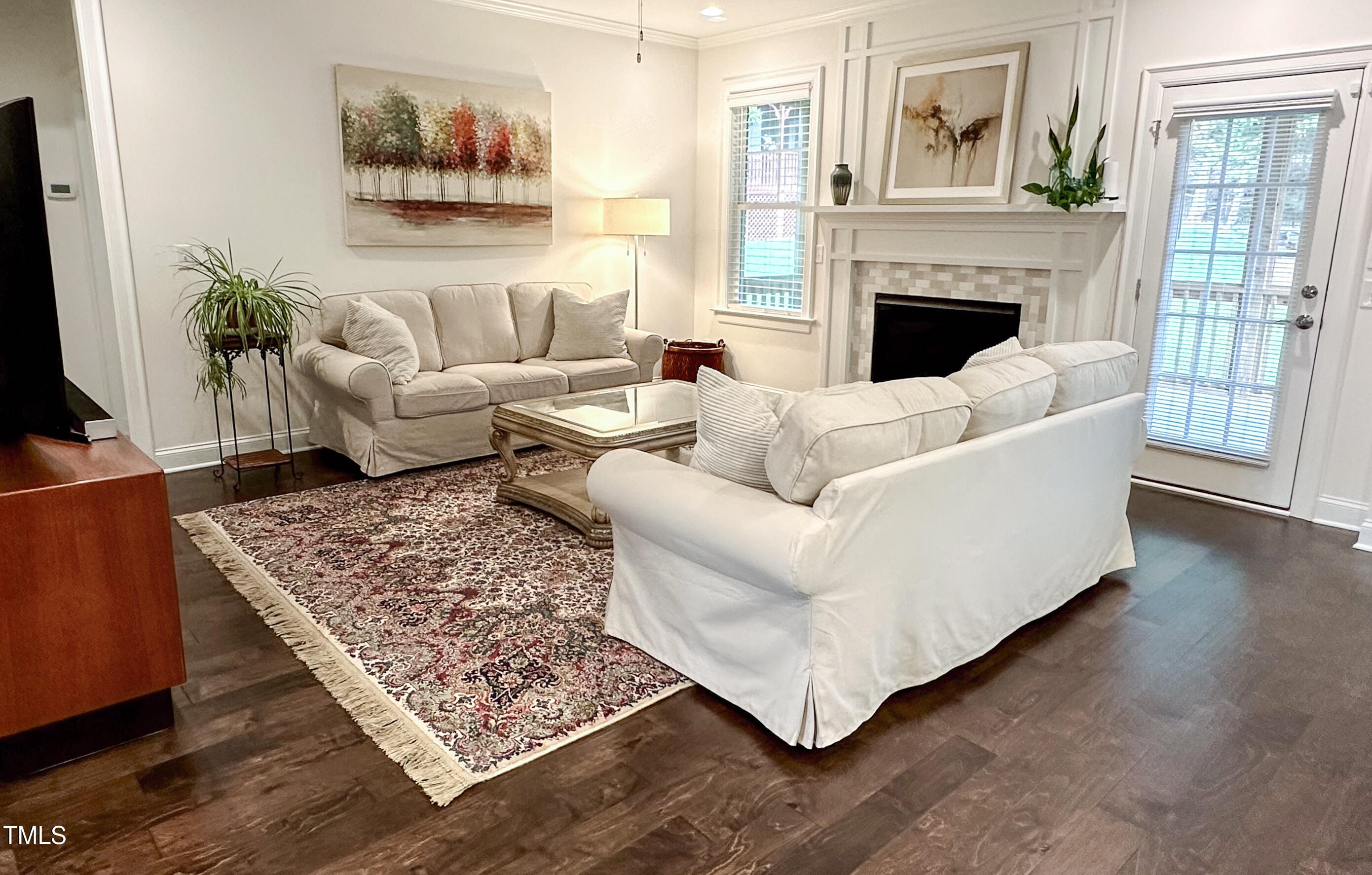 409 Eagle Court Henderson, NC 27536 - Photo 6 of 54 a living room with furniture and a fireplace