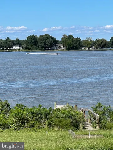 a view of a golf course with a lake