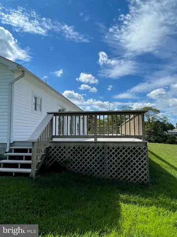 a sign on a pole on a street