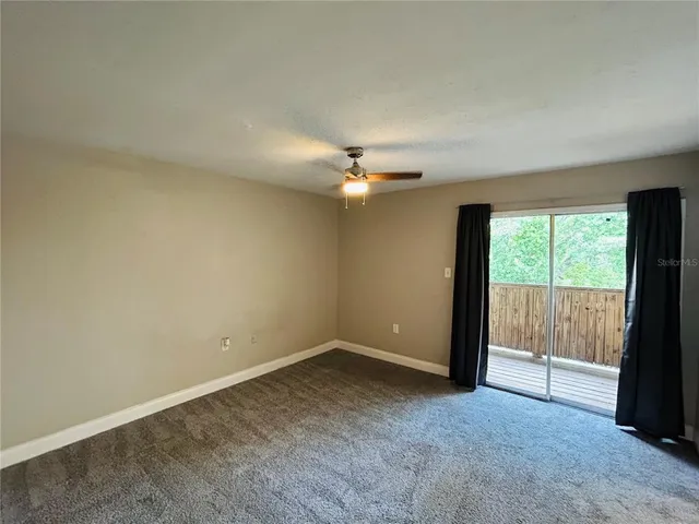wooden floor and window in an empty room
