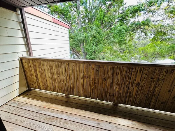 a view of a wooden fence