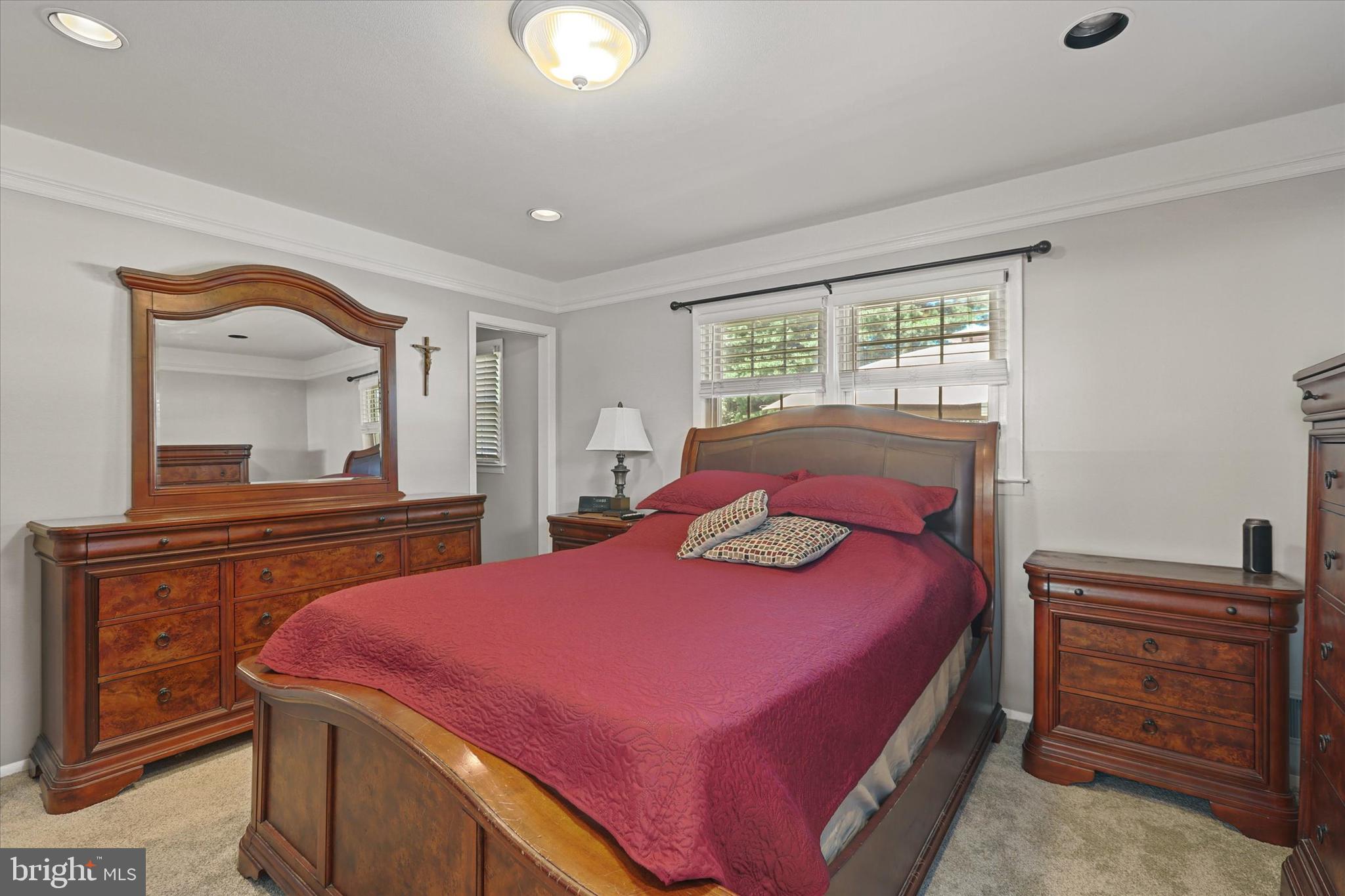 2014 Klockner Road Hamilton, NJ 08619 - Photo 14 of 36 Primary bedroom w/crown molding and bathroom