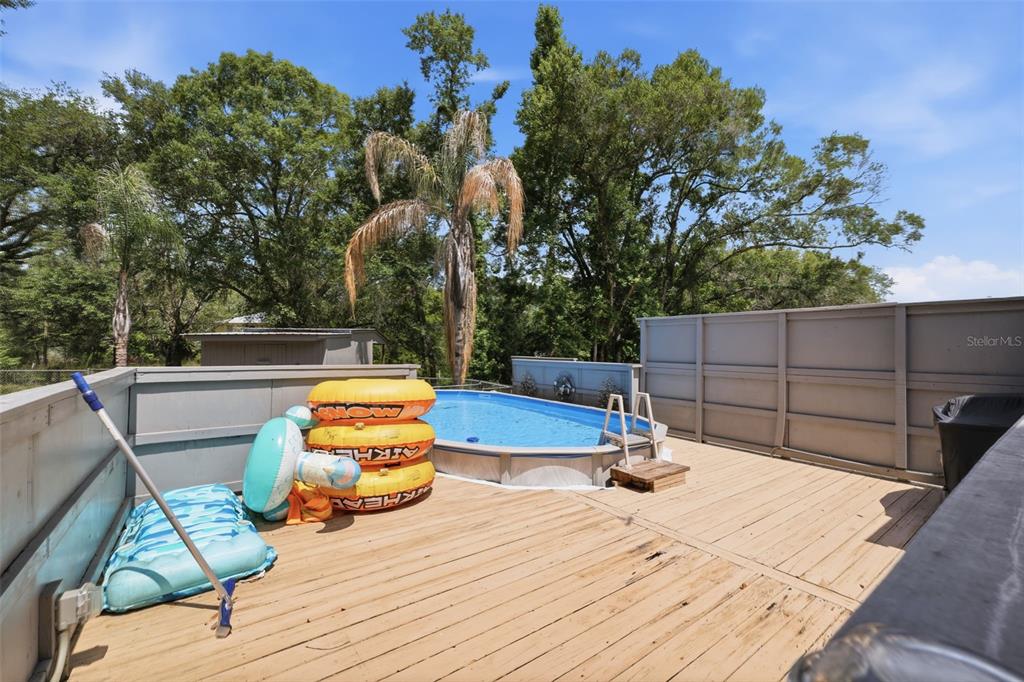 3183 Cedley Road Dade City, FL 33523 - Photo 20 of 48 a view of a terrace with chairs