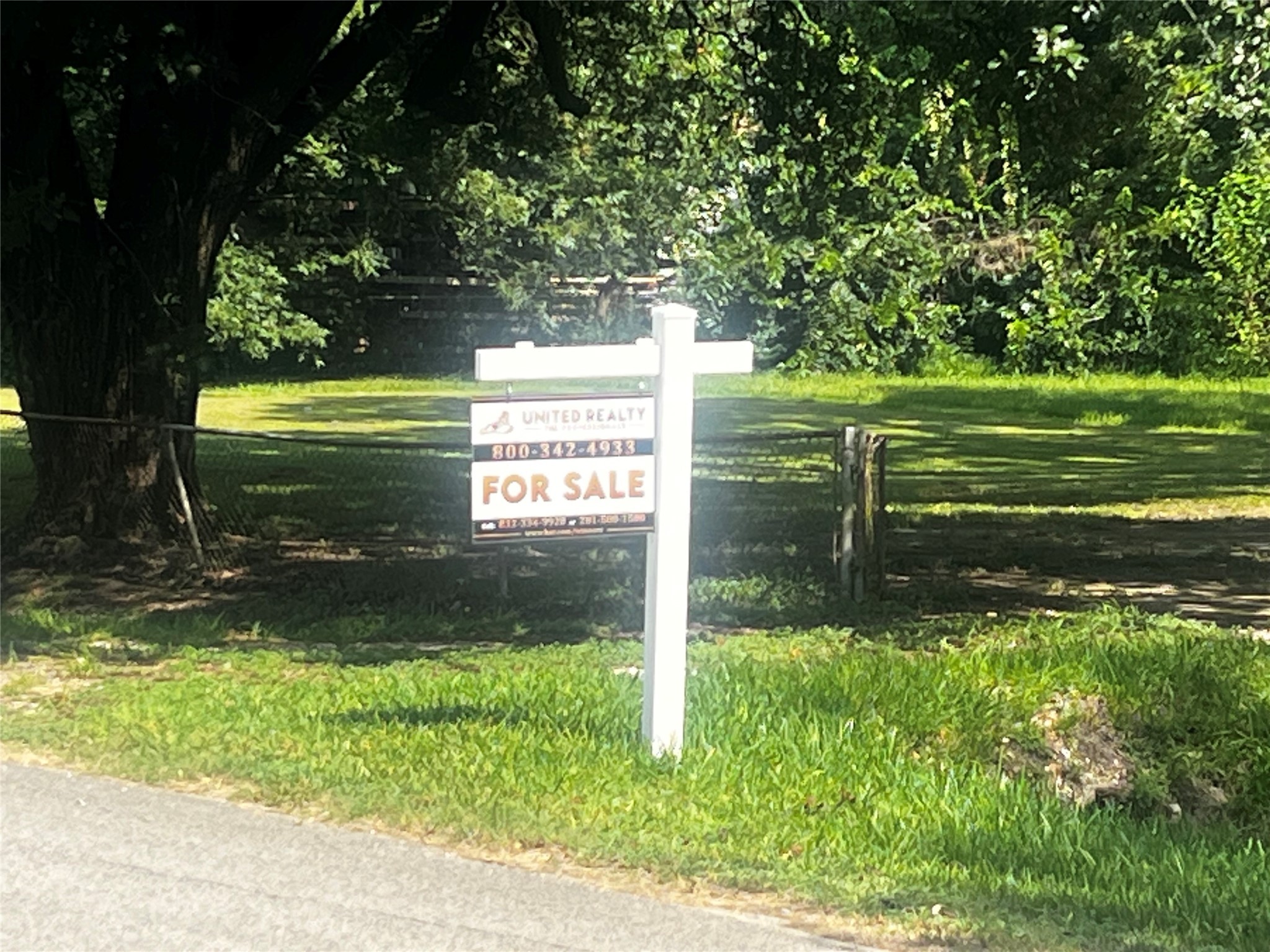 207 Gulf Pump Road Crosby, TX 77532 - Photo 1 of 4 a view of a park that has a large trees