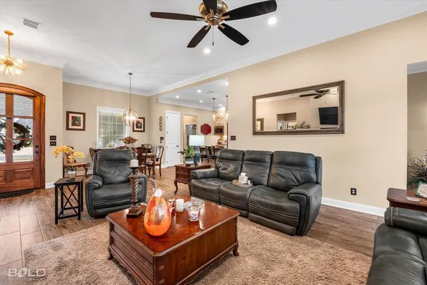 a living room with furniture and a window