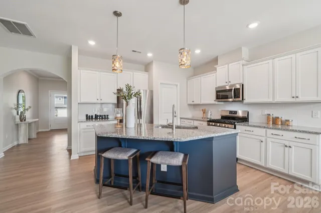 a kitchen with lots of counter space sink and appliances