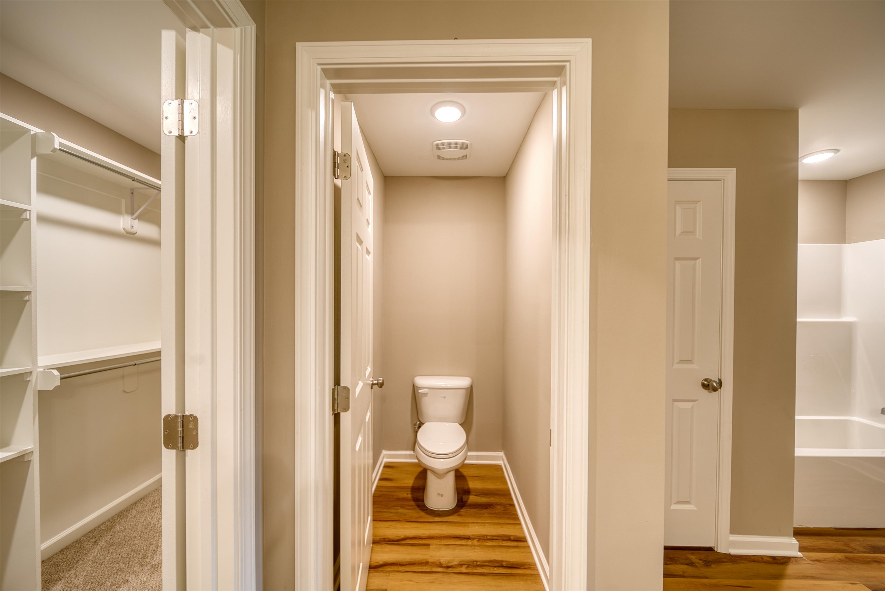 109 Walnut Ridge Ripley, TN 38063 - Photo 21 of 39 a view of a hallway with toilet and front door