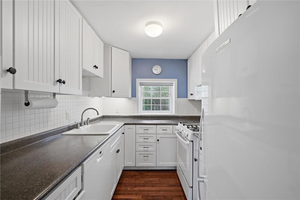 7092 Mercer Road Polk, PA 16342 - Photo 17 of 50 a kitchen with a sink cabinets and window