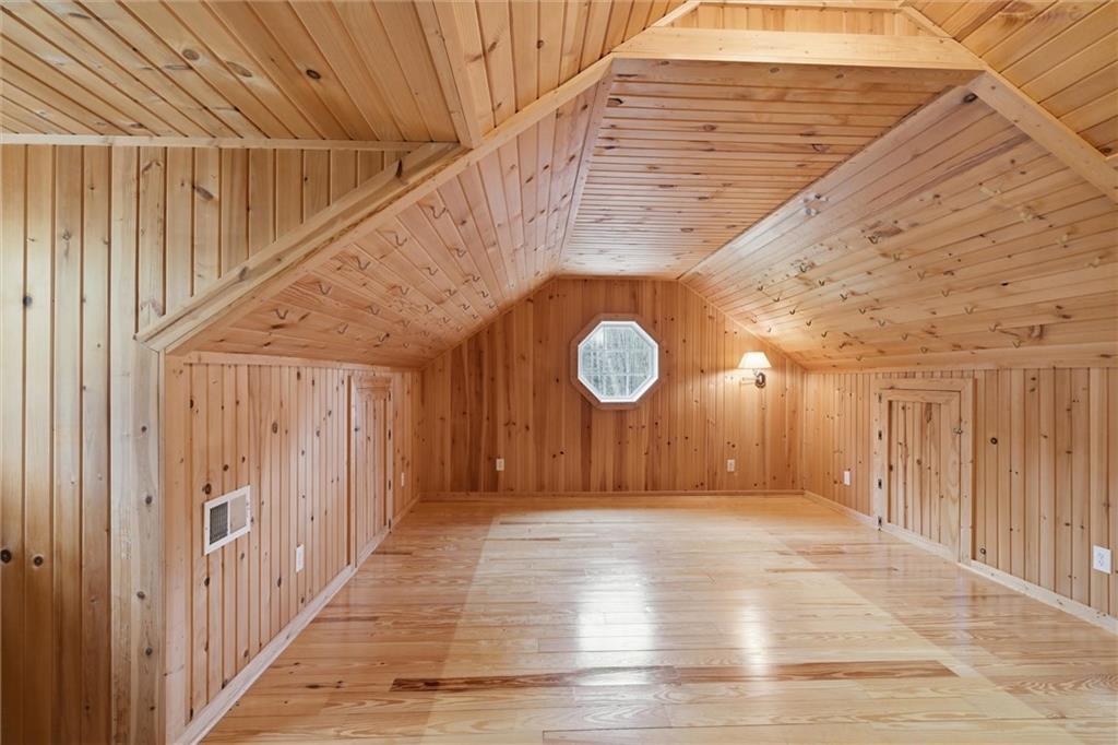 7092 Mercer Road Polk, PA 16342 - Photo 26 of 50 a view of a hallway with wooden floor