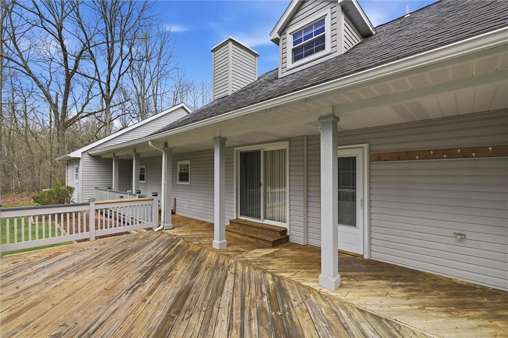 7092 Mercer Road Polk, PA 16342 - Photo 35 of 50 a view of a house with a roof deck