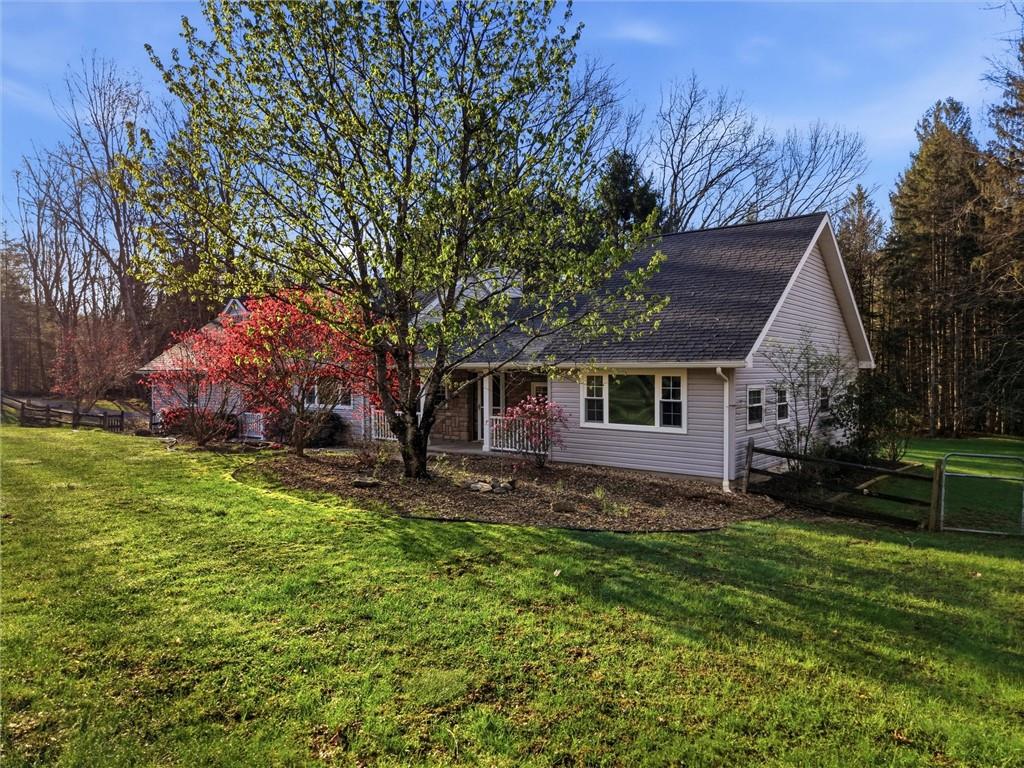 7092 Mercer Road Polk, PA 16342 - Photo 37 of 50 a view of a house with a yard