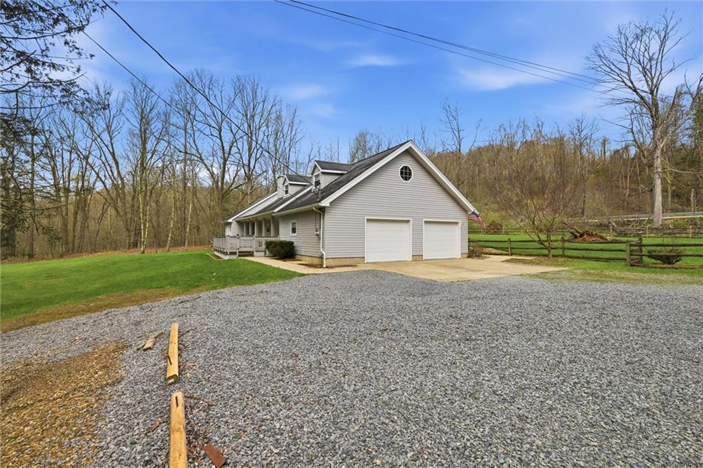 7092 Mercer Road Polk, PA 16342 - Photo 41 of 50 a view of a house with a yard