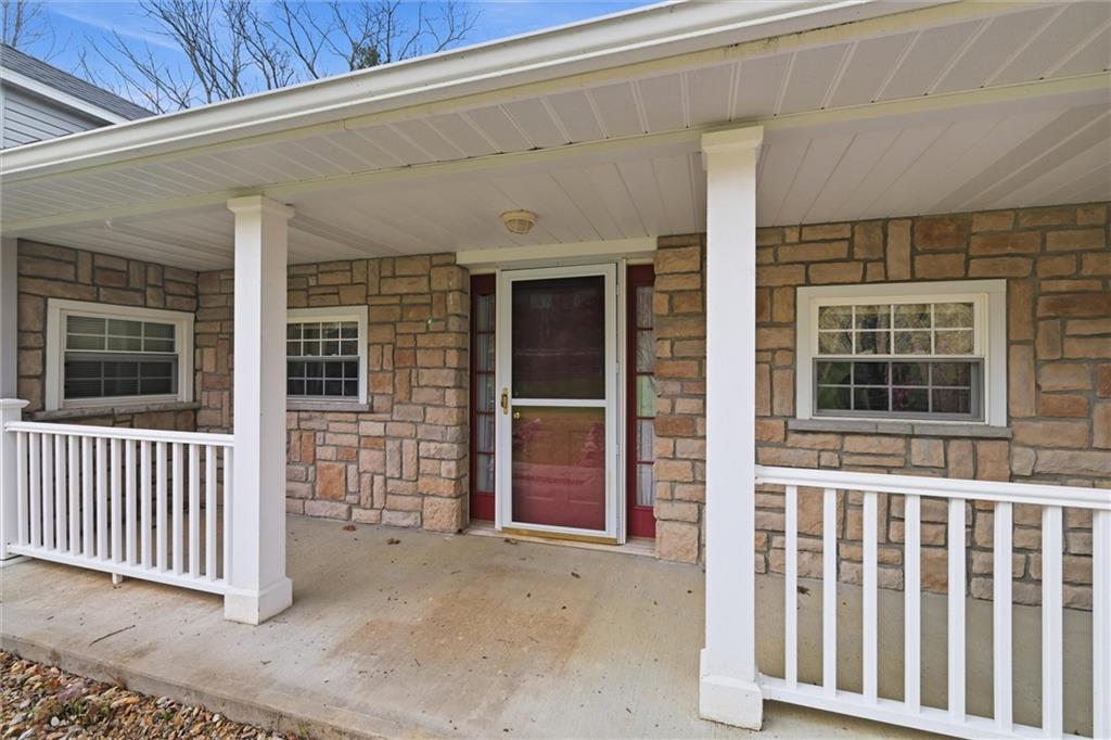 7092 Mercer Road Polk, PA 16342 - Photo 6 of 50 a view of a house with a large window