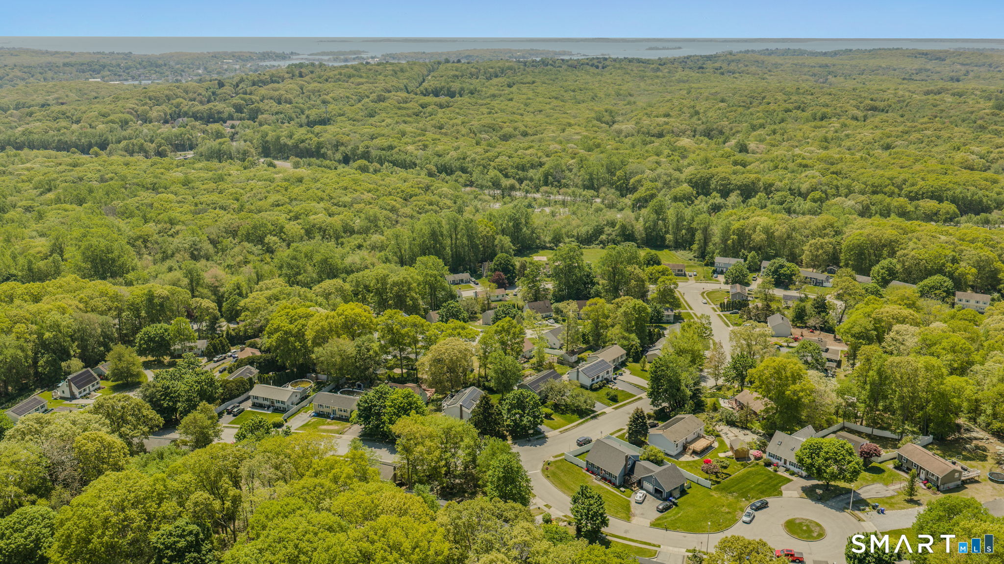 6 Amherst Court Groton, CT 06355 - Photo 36 of 40 a view of a field with an ocean