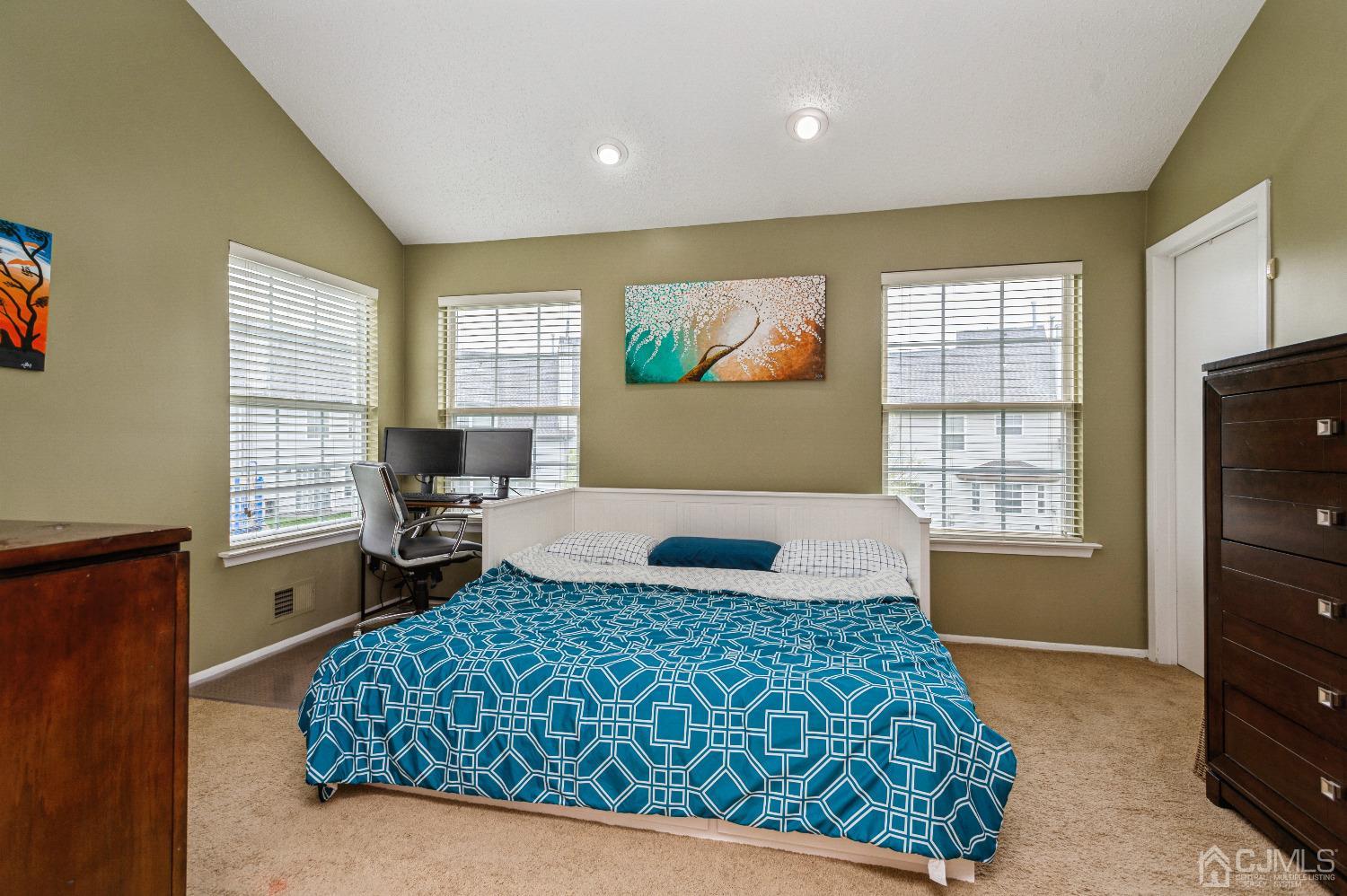 409 Draco Road Piscataway, NJ 08854 - Photo 17 of 28 a bedroom with a bed and wooden floor