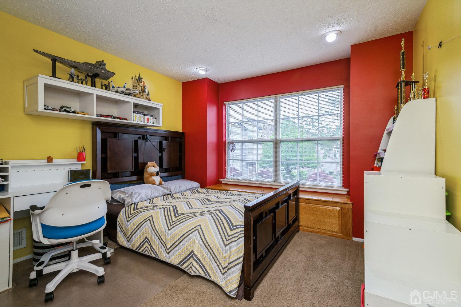 409 Draco Road Piscataway, NJ 08854 - Photo 19 of 28 a bed room with a bed and a chair