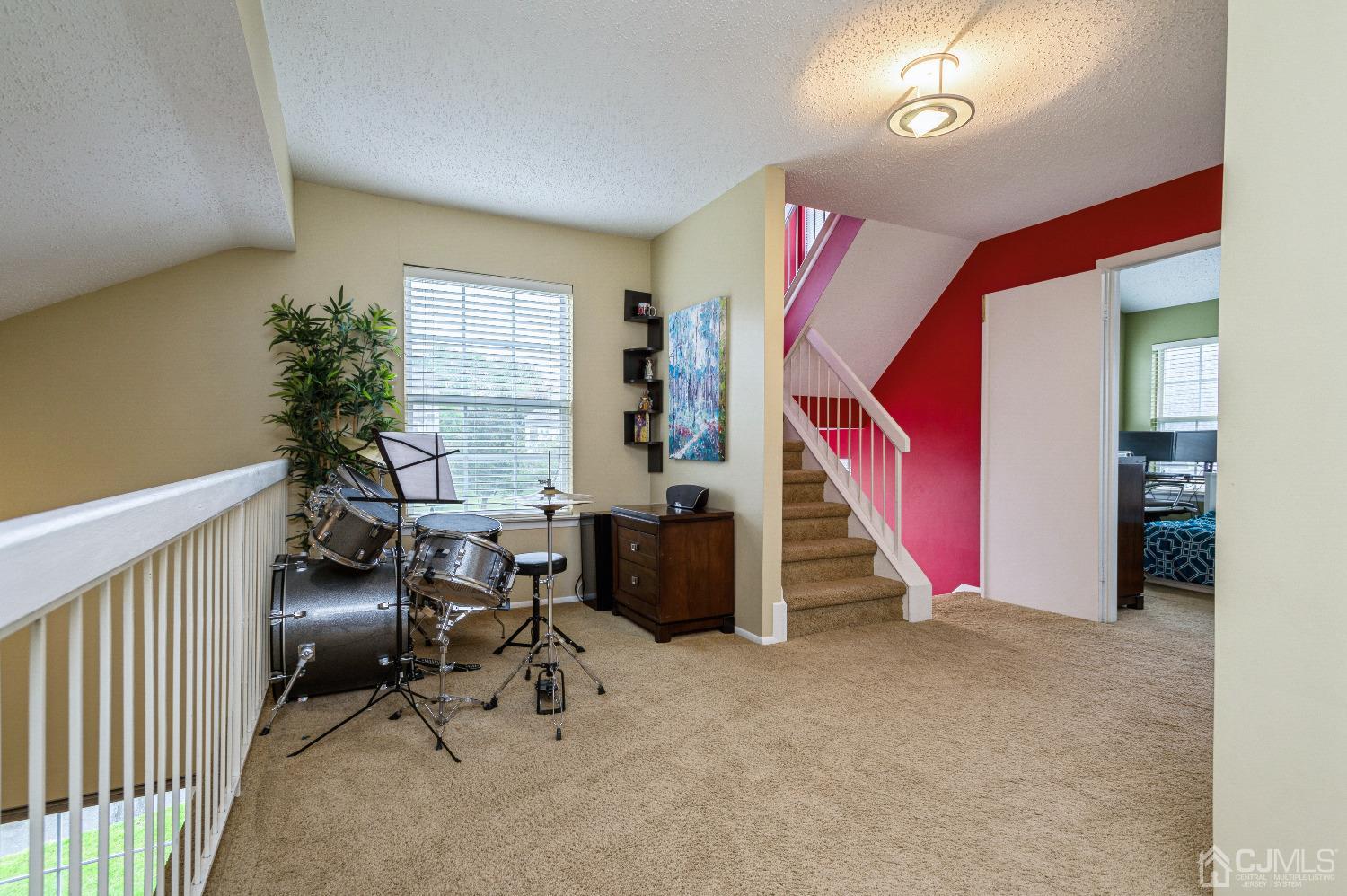 409 Draco Road Piscataway, NJ 08854 - Photo 21 of 28 a view of livingroom with furniture and windows